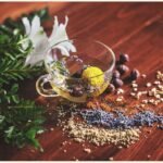 clear tea cup on brown surface, herbal tea types, tisanes